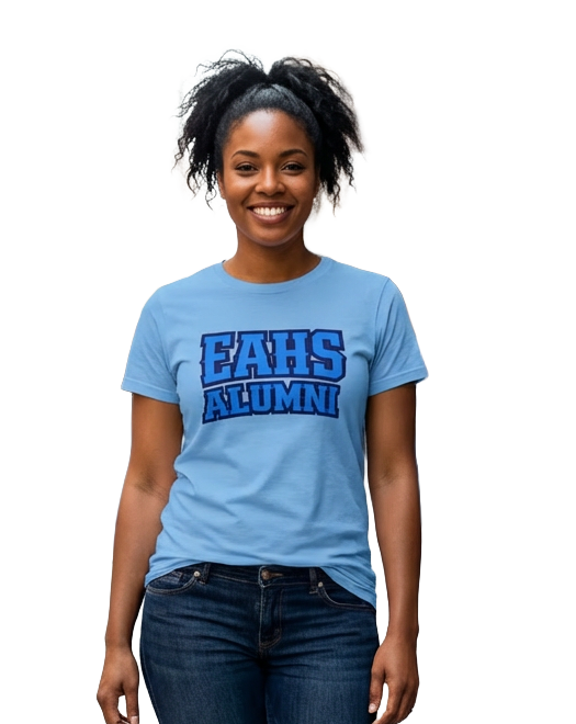 Woman wearing a light blue t-shirt with 'EAHS ALUMNI' text on a white background EAHS Alumni Tee - Edwin Allen High School Alumni Shirt - EAHS ALUMNI Front - Crest Back - Unisex T-Shirt